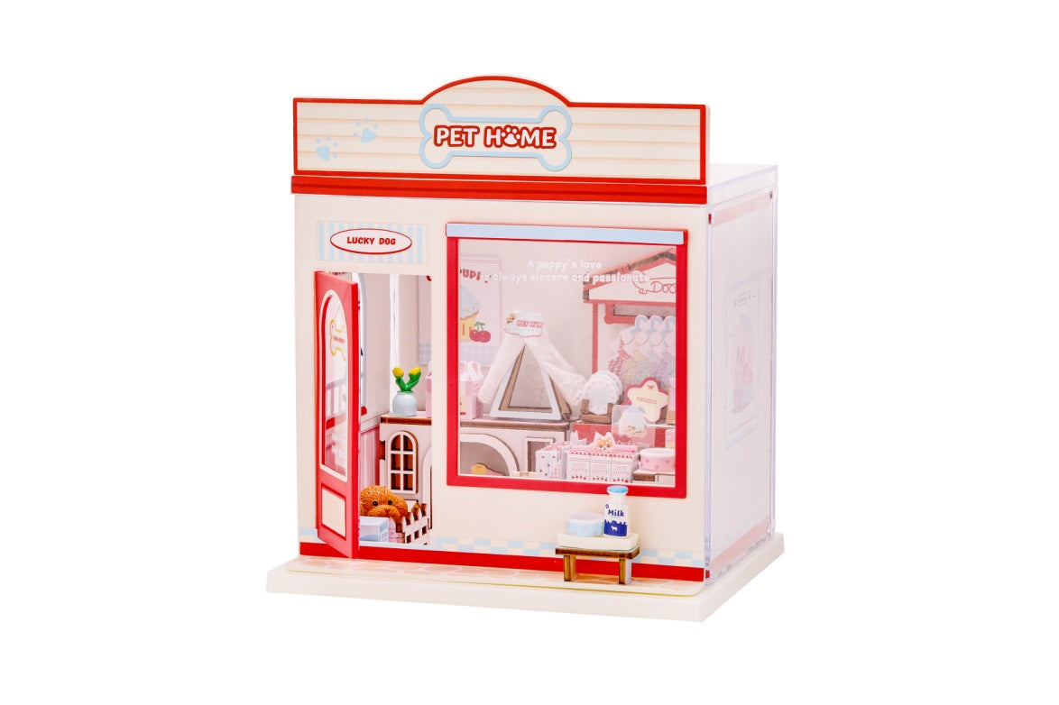 iTotal Mini-Shop Spielset Tierhandlung Außenansicht mit Schaufenster, geöffneter roter Tür, Ladenschild und detaillierter Inneneinrichtung.