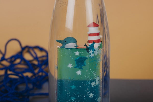 PETIT BOUM - Sensorikspielzeug "Move Bottle Whale Calm"