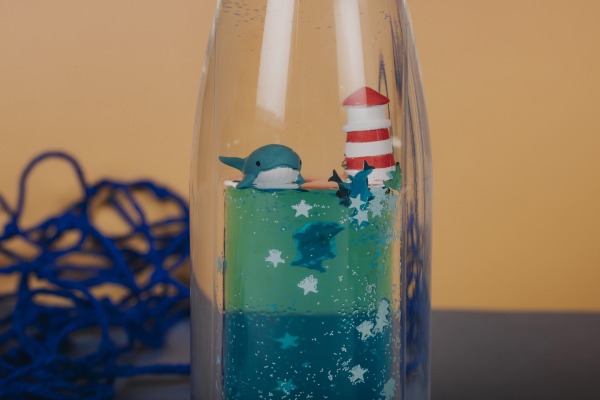 PETIT BOUM - Sensorikspielzeug "Move Bottle Whale Calm"